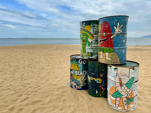 Painted Barrels on the Beach