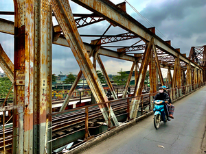 Crossing the Bridge on a Motorbike