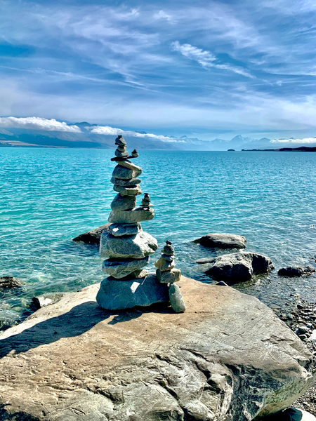 Rock Balancing in Front of the Lake Print