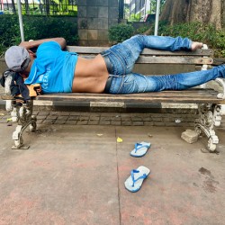 Napping on a Public Bench Jakarta