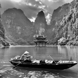 BW Lady Rowing the Boat in Vietnam