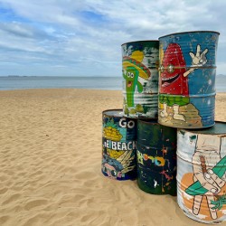 Painted Barrels on the Beach