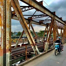 Crossing the Bridge on a Motorbike