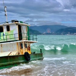 Green Boat on the Beach