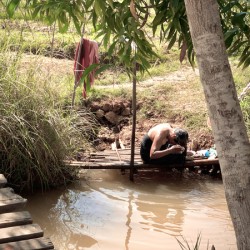 Lady Washing her Hair in the River