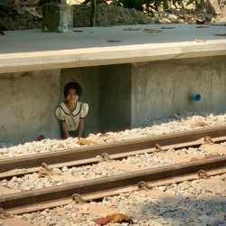 Little Girl Hiding from the Train