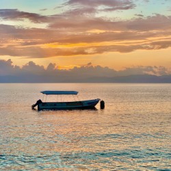 Lonely Boat at Sunset
