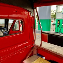 Red Truck at the Pump