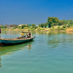 Standing in Front of the Boat