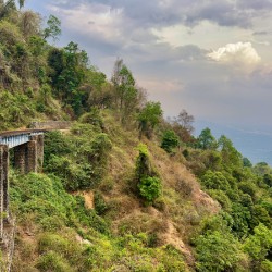 Toy Train by the Mountain