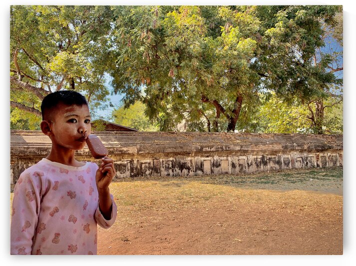 Myanmar Boy Eating a Frozen Candy Bar by Jimmy Roy Photos