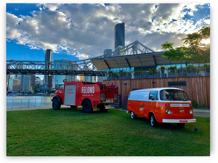 Red Trucks in Front of the Bridge by Jimmy Roy Photos