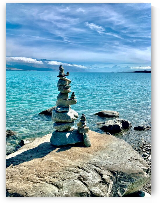 Rock Balancing in Front of the Lake by Jimmy Roy Photos