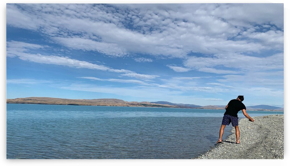 Rock Throwing on the Lake by Jimmy Roy Photos