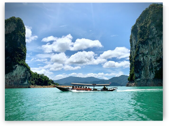 Boat Between Massive Rocks by Jimmy Roy Photos