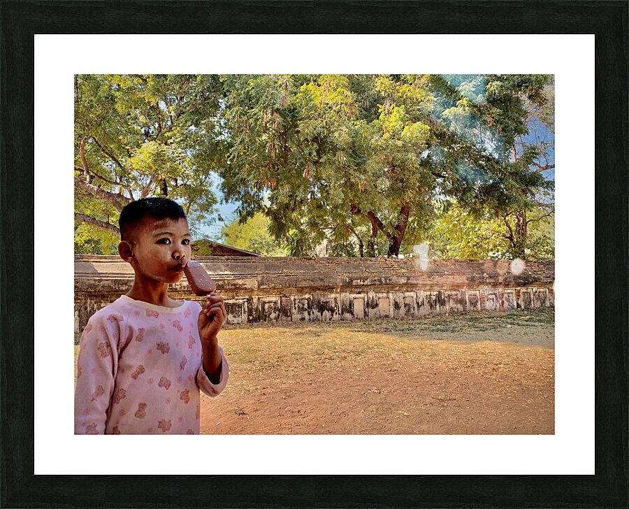 Myanmar Boy Eating a Frozen Candy Bar Picture Frame print
