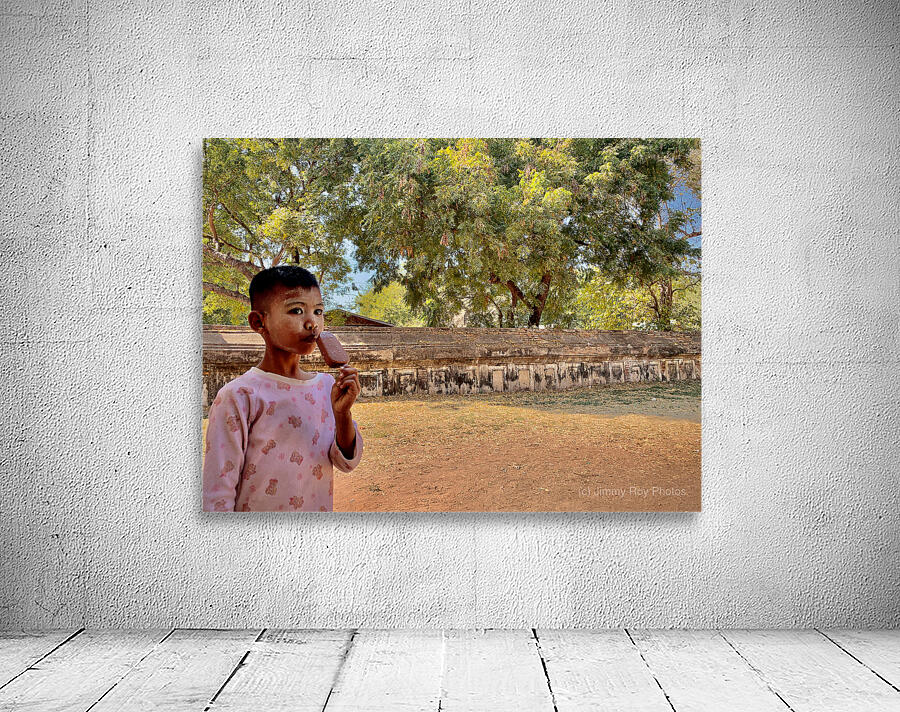 Myanmar Boy Eating a Frozen Candy Bar Wall Preview