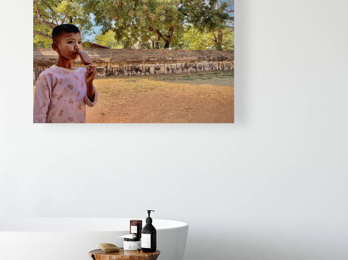 Myanmar Boy Eating a Frozen Candy Bar by Jimmy Roy Photos