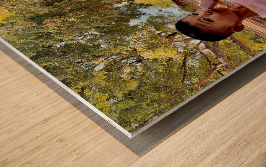 Myanmar Boy Eating a Frozen Candy Bar Wood print