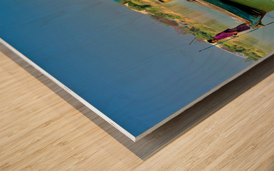 Standing in Front of the Boat Wood print